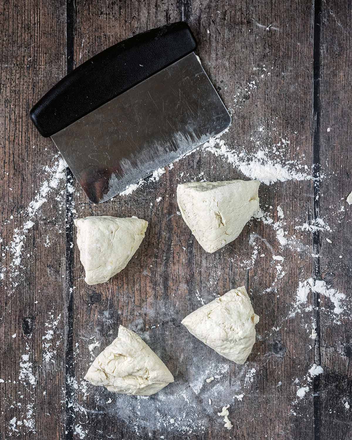 The kneaded dough cut into four pieces.
