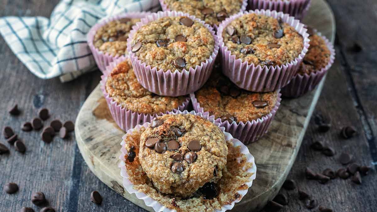 High protein banana muffins on a serving board.