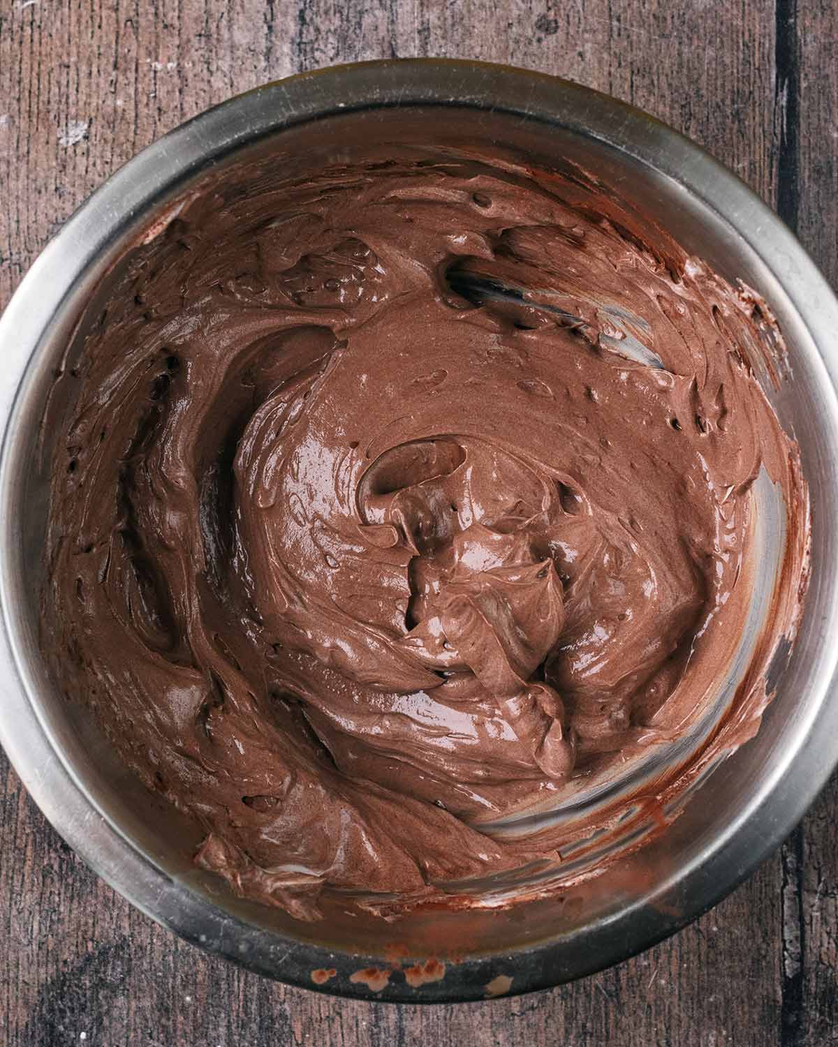 The yogurt and cocoa mixed together in the bowl.