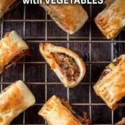 Sausage rolls with vegetables with a text overlay title.