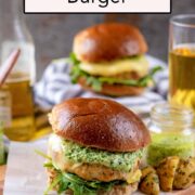 Pesto chicken burger with a text overlay title.