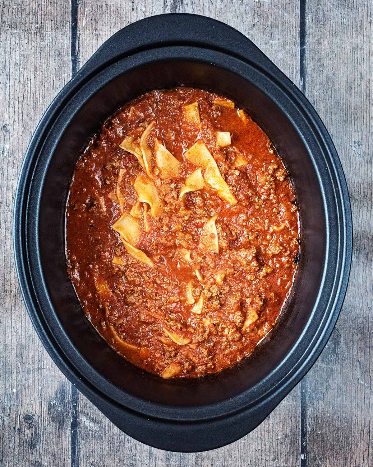 The lasagna sheets cooked into the sauce.