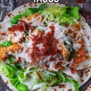 Chicken caesar tacos with a text overlay title.