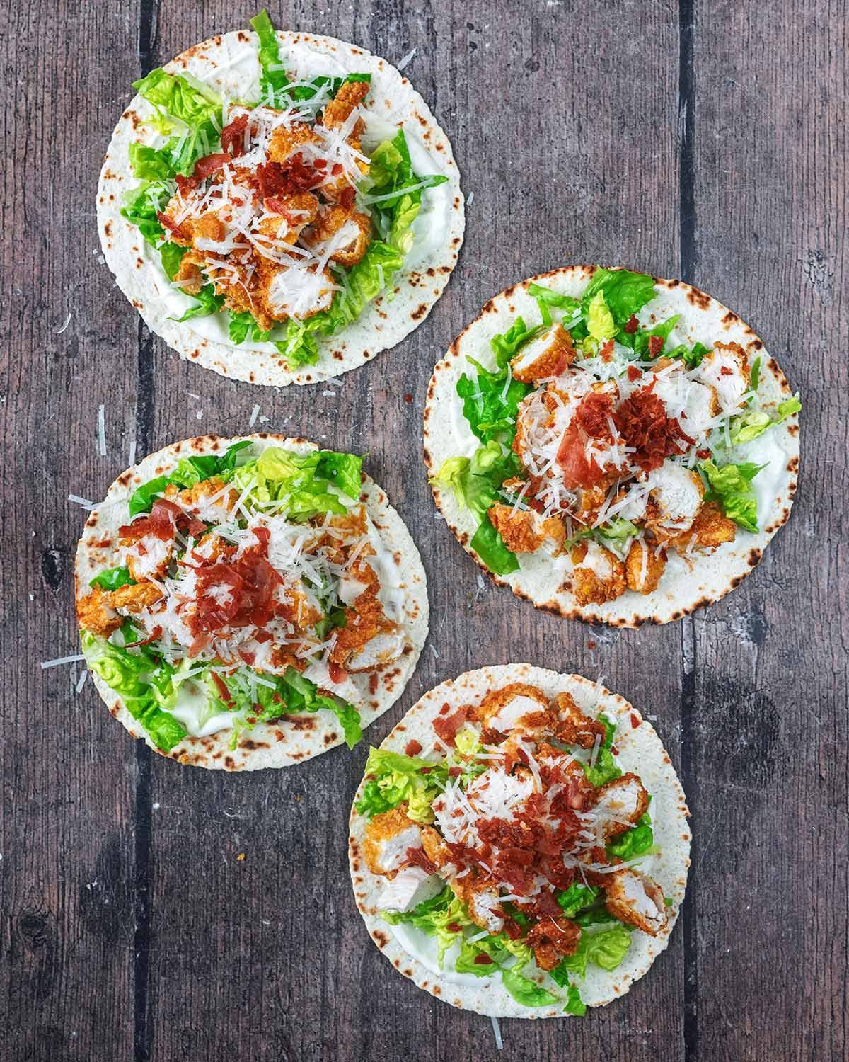 Grated parmesan and chopped crispy prosciutto added on top of the chicken.