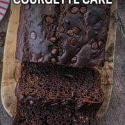 Chocolate courgette loaf cake with a ttext title overlay.